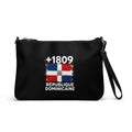 Sac à main noir République Dominicaine +1809 avec drapeau dominicain floqué effet éclaboussure de peinture - vue de face - Indicatif Fier