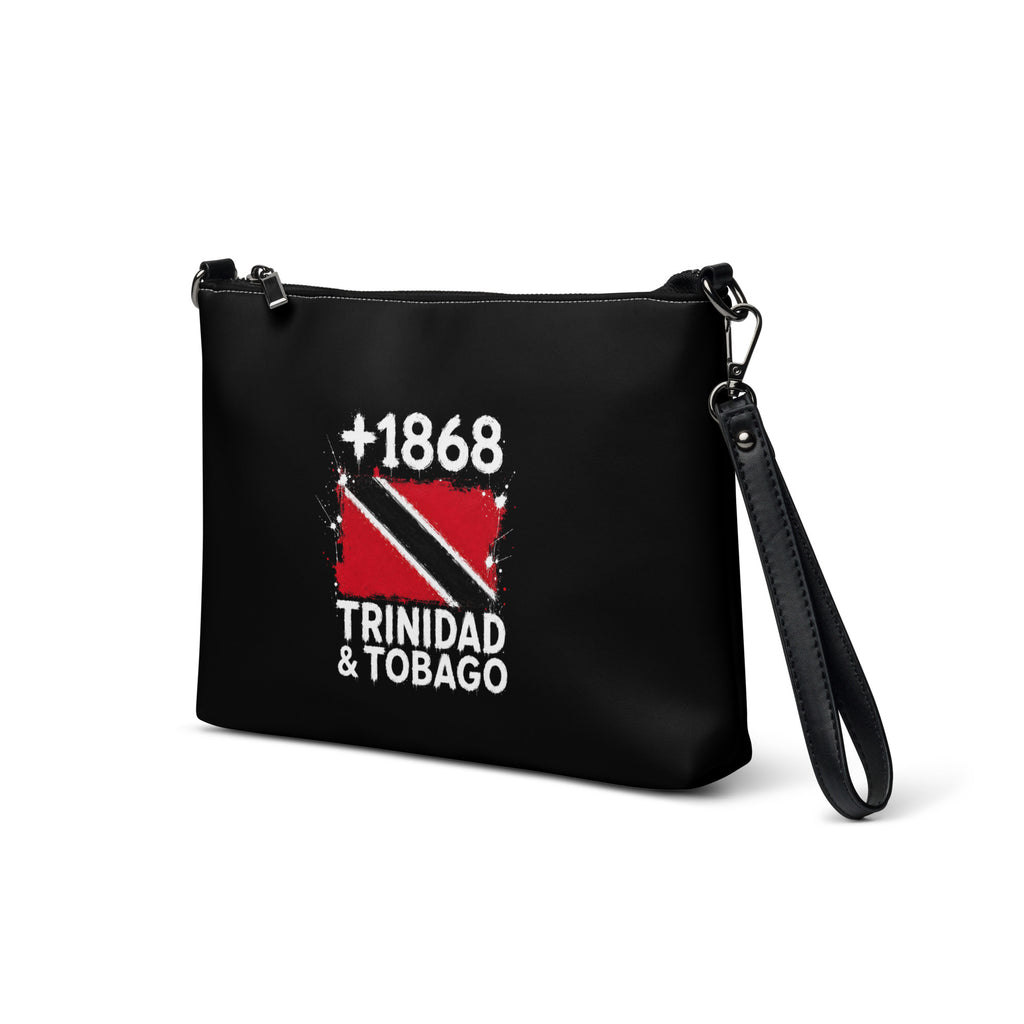 Sac à main pochette noire Trinidad & Tobago +1868 avec drapeau trinidadien floqué effet éclaboussure de peinture - vue de trois quarts - Indicatif Fier