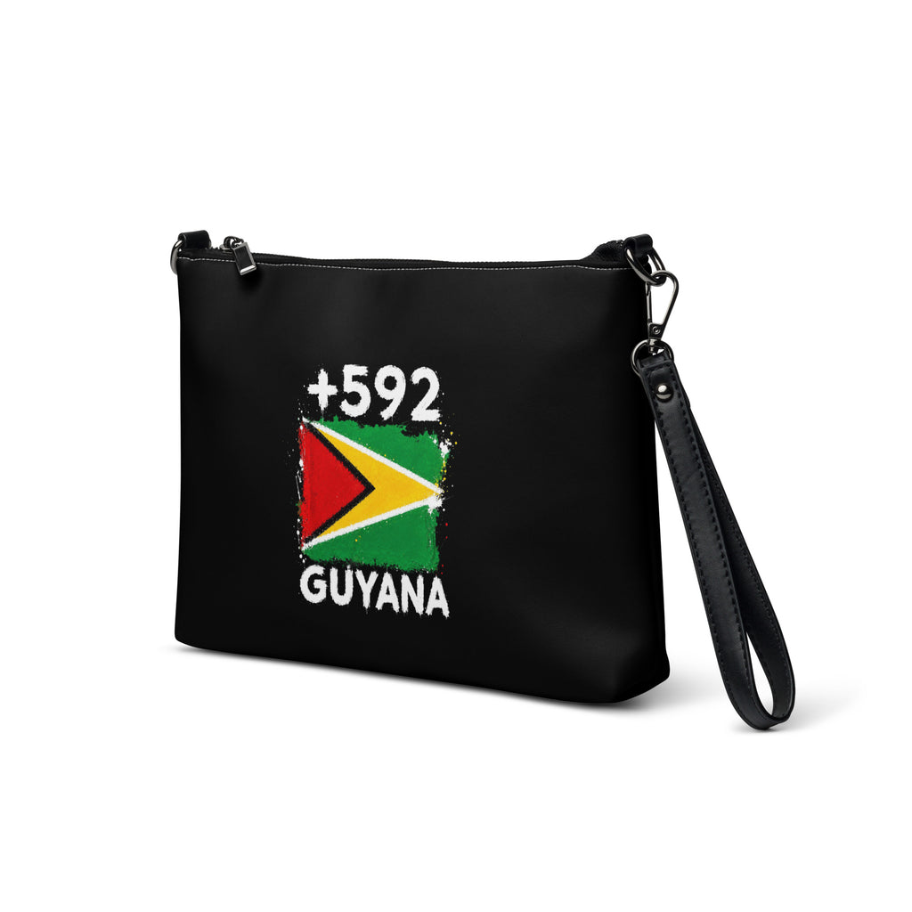 Sac à Main Guyana +592 - Noir avec drapeau floqué effet éclaboussure de peinture - vue de trois-quarts gauche - Indicatif Fier